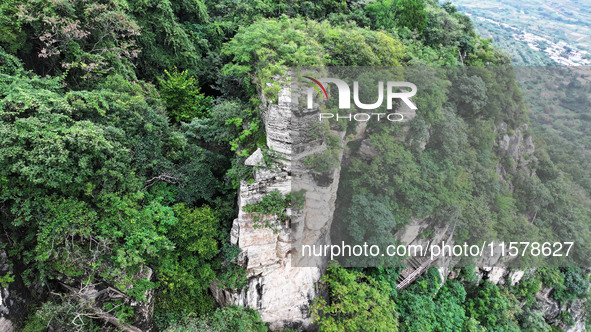 View of the Xiong 'er Mountain Rift Valley in Zaozhuang, China, on September 15, 2024. This geological formation results from a landslide ca...