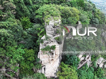 View of the Xiong 'er Mountain Rift Valley in Zaozhuang, China, on September 15, 2024. This geological formation results from a landslide ca...