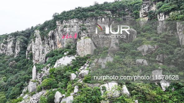 View of the Xiong 'er Mountain Rift Valley in Zaozhuang, China, on September 15, 2024. This geological formation results from a landslide ca...