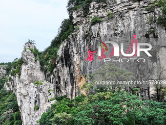 View of the Xiong 'er Mountain Rift Valley in Zaozhuang, China, on September 15, 2024. This geological formation results from a landslide ca...