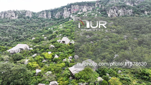 View of the Xiong 'er Mountain Rift Valley in Zaozhuang, China, on September 15, 2024. This geological formation results from a landslide ca...