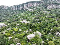 View of the Xiong 'er Mountain Rift Valley in Zaozhuang, China, on September 15, 2024. This geological formation results from a landslide ca...