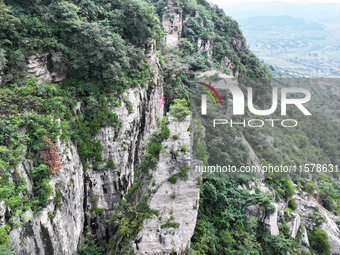 View of the Xiong 'er Mountain Rift Valley in Zaozhuang, China, on September 15, 2024. This geological formation results from a landslide ca...