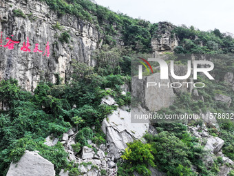 View of the Xiong 'er Mountain Rift Valley in Zaozhuang, China, on September 15, 2024. This geological formation results from a landslide ca...