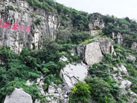 View of the Xiong 'er Mountain Rift Valley in Zaozhuang, China, on September 15, 2024. This geological formation results from a landslide ca...