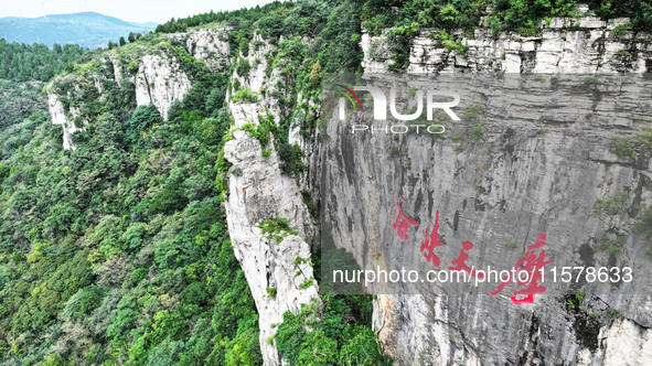 View of the Xiong 'er Mountain Rift Valley in Zaozhuang, China, on September 15, 2024. This geological formation results from a landslide ca...