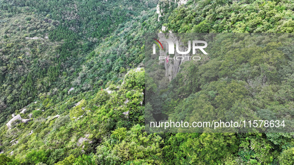 View of the Xiong 'er Mountain Rift Valley in Zaozhuang, China, on September 15, 2024. This geological formation results from a landslide ca...