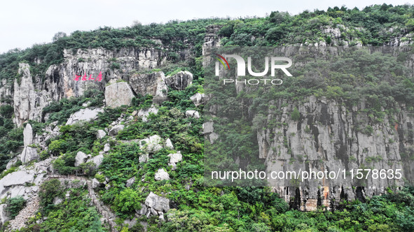 View of the Xiong 'er Mountain Rift Valley in Zaozhuang, China, on September 15, 2024. This geological formation results from a landslide ca...