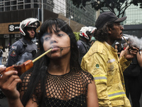 Protesters hold a demonstration against the fires and the climate situation in Brazil and for agrarian reform on Avenida Paulista, in the ce...