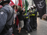 Protesters hold a demonstration against the fires and the climate situation in Brazil and for agrarian reform on Avenida Paulista, in the ce...