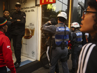 Protesters hold a demonstration against the fires and the climate situation in Brazil and for agrarian reform on Avenida Paulista, in the ce...