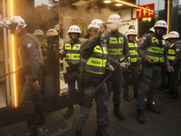 Protesters hold a demonstration against the fires and the climate situation in Brazil and for agrarian reform on Avenida Paulista, in the ce...