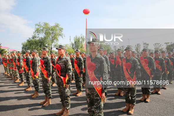 New recruits attend a send-off ceremony for the 2024 autumn Army recruits in Lianyungang, China, on September 16, 2024. 