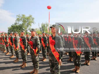 New recruits attend a send-off ceremony for the 2024 autumn Army recruits in Lianyungang, China, on September 16, 2024. (