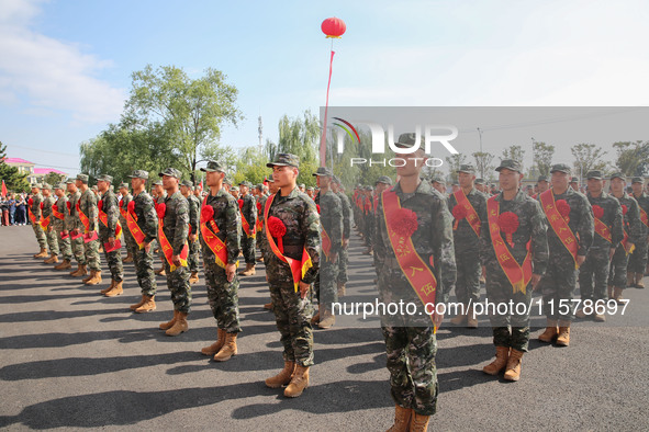 New recruits attend a send-off ceremony for the 2024 autumn Army recruits in Lianyungang, China, on September 16, 2024. 