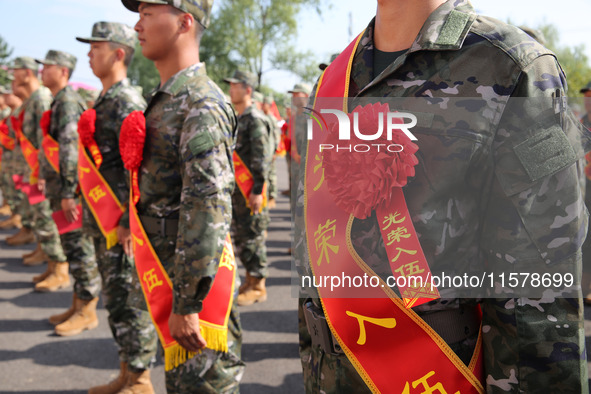 New recruits attend a send-off ceremony for the 2024 autumn Army recruits in Lianyungang, China, on September 16, 2024. 