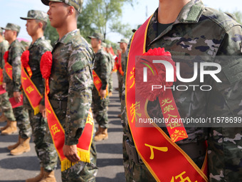 New recruits attend a send-off ceremony for the 2024 autumn Army recruits in Lianyungang, China, on September 16, 2024. (