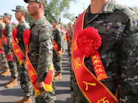 New recruits attend a send-off ceremony for the 2024 autumn Army recruits in Lianyungang, China, on September 16, 2024. (