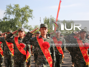 New recruits attend a send-off ceremony for the 2024 autumn Army recruits in Lianyungang, China, on September 16, 2024. (