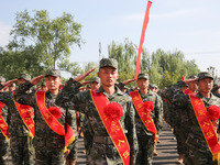 New recruits attend a send-off ceremony for the 2024 autumn Army recruits in Lianyungang, China, on September 16, 2024. (