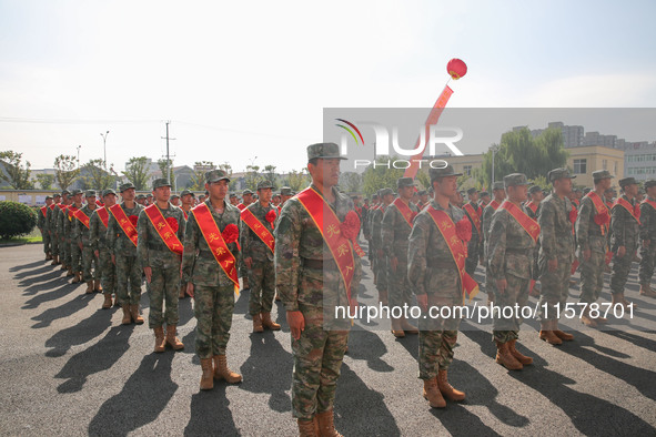 New recruits attend a send-off ceremony for the 2024 autumn Army recruits in Lianyungang, China, on September 16, 2024. 