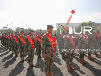 New recruits attend a send-off ceremony for the 2024 autumn Army recruits in Lianyungang, China, on September 16, 2024. (