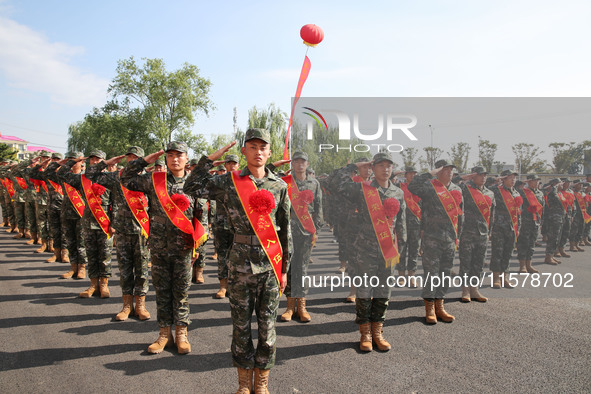 New recruits attend a send-off ceremony for the 2024 autumn Army recruits in Lianyungang, China, on September 16, 2024. 