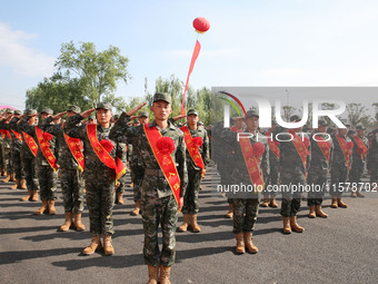 New recruits attend a send-off ceremony for the 2024 autumn Army recruits in Lianyungang, China, on September 16, 2024. (