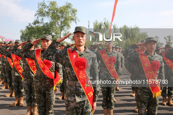 New recruits attend a send-off ceremony for the 2024 autumn Army recruits in Lianyungang, China, on September 16, 2024. 