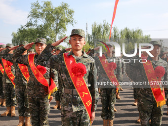 New recruits attend a send-off ceremony for the 2024 autumn Army recruits in Lianyungang, China, on September 16, 2024. (