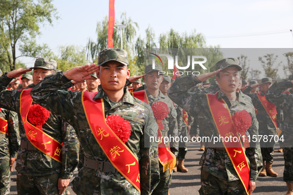 New recruits attend a send-off ceremony for the 2024 autumn Army recruits in Lianyungang, China, on September 16, 2024. 