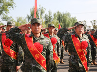 New recruits attend a send-off ceremony for the 2024 autumn Army recruits in Lianyungang, China, on September 16, 2024. (