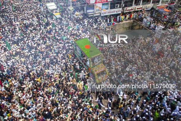 Muslims take part in a procession on the occasion of Eid Milad-un-Nabi, the birth anniversary of Prophet Muhammad, in Chittagong, Bangladesh...