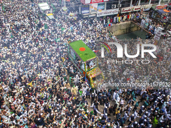 Muslims take part in a procession on the occasion of Eid Milad-un-Nabi, the birth anniversary of Prophet Muhammad, in Chittagong, Bangladesh...