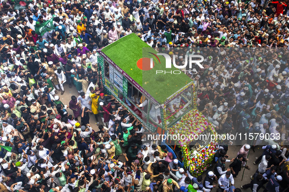 Muslims take part in a procession on the occasion of Eid Milad-un-Nabi, the birth anniversary of Prophet Muhammad, in Chittagong, Bangladesh...