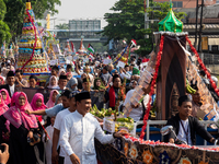 Hundreds of Muslims participate in the boat procession tradition, known as 'Kirab Perahu,' during the Prophet Muhammad's birthday celebratio...