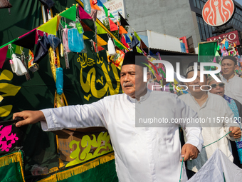 Hundreds of Muslims participate in the boat procession tradition, known as 'Kirab Perahu,' during the Prophet Muhammad's birthday celebratio...