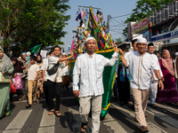 Hundreds of Muslims participate in the boat procession tradition, known as 'Kirab Perahu,' during the Prophet Muhammad's birthday celebratio...