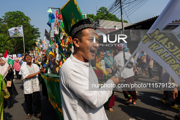 Hundreds of Muslims participate in the boat procession tradition, known as 'Kirab Perahu,' during the Prophet Muhammad's birthday celebratio...