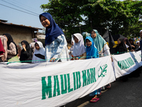 Hundreds of Muslims participate in the boat procession tradition, known as 'Kirab Perahu,' during the Prophet Muhammad's birthday celebratio...