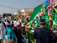 Hundreds of Muslims participate in the boat procession tradition, known as 'Kirab Perahu,' during the Prophet Muhammad's birthday celebratio...