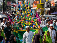 Hundreds of Muslims participate in the boat procession tradition, known as 'Kirab Perahu,' during the Prophet Muhammad's birthday celebratio...