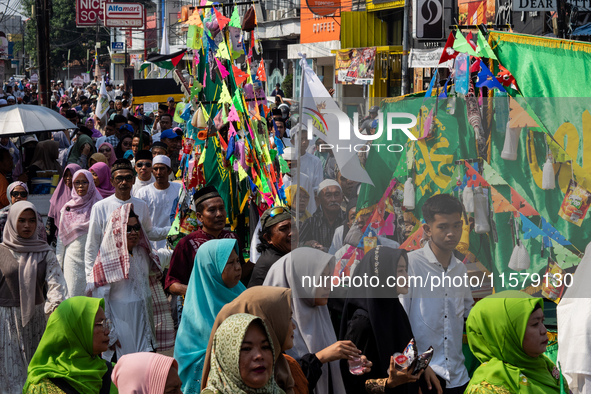 Hundreds of Muslims participate in the boat procession tradition, known as 'Kirab Perahu,' during the Prophet Muhammad's birthday celebratio...