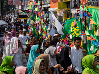 Hundreds of Muslims participate in the boat procession tradition, known as 'Kirab Perahu,' during the Prophet Muhammad's birthday celebratio...