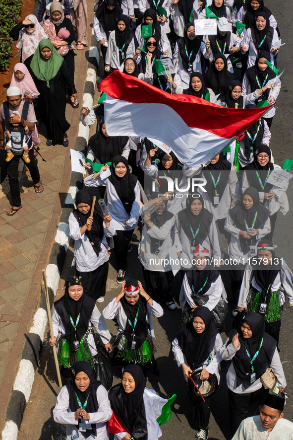 Hundreds of Muslims participate in the boat procession tradition, known as 'Kirab Perahu,' during the Prophet Muhammad's birthday celebratio...