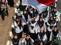 Hundreds of Muslims participate in the boat procession tradition, known as 'Kirab Perahu,' during the Prophet Muhammad's birthday celebratio...