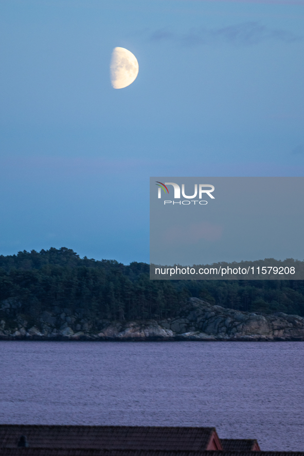 A view of the first quarter of moon (illumination: 63%) in Kristiansand, Norway, on September 12, 2024. 