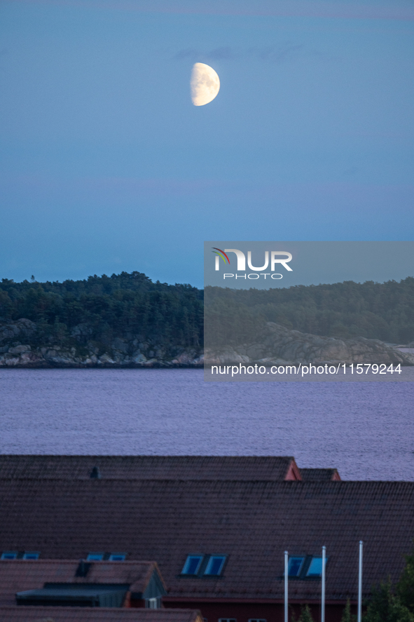 A view of the first quarter of moon (illumination: 63%) in Kristiansand, Norway, on September 12, 2024. 