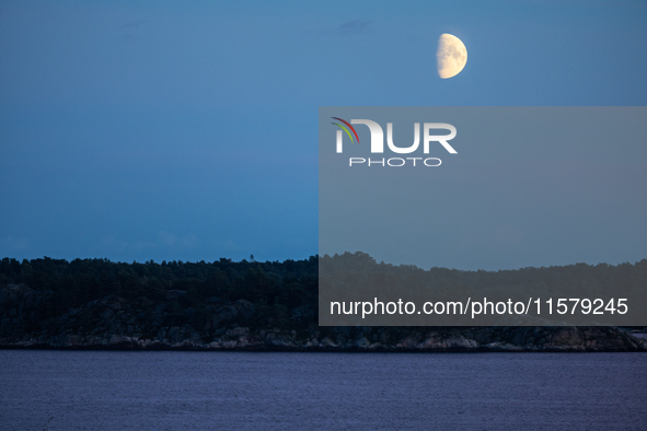 A view of the first quarter of moon (illumination: 63%) in Kristiansand, Norway, on September 12, 2024. 