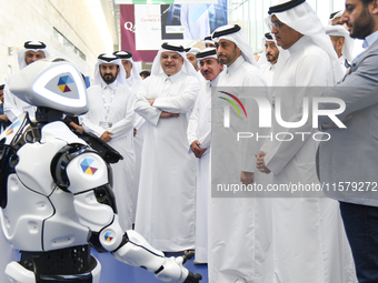 People visit the ConteQ Expo24 (Advanced Technology for Construction & Services Expo) at the Qatar National Convention Centre (QNCC) in Doha...